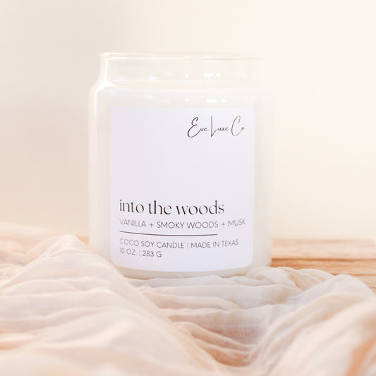 into the woods candle | vanilla + smoky woods + musk